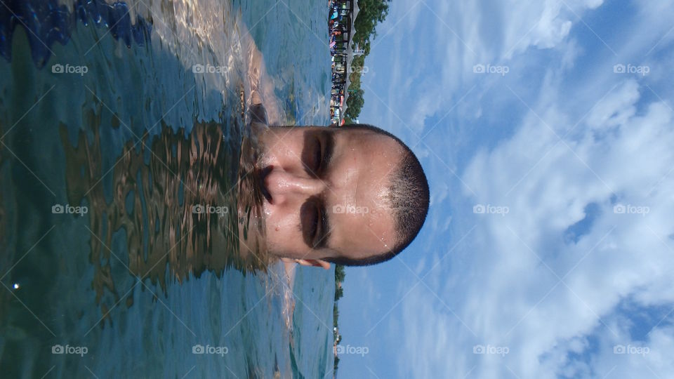 Man on the surface of the sea