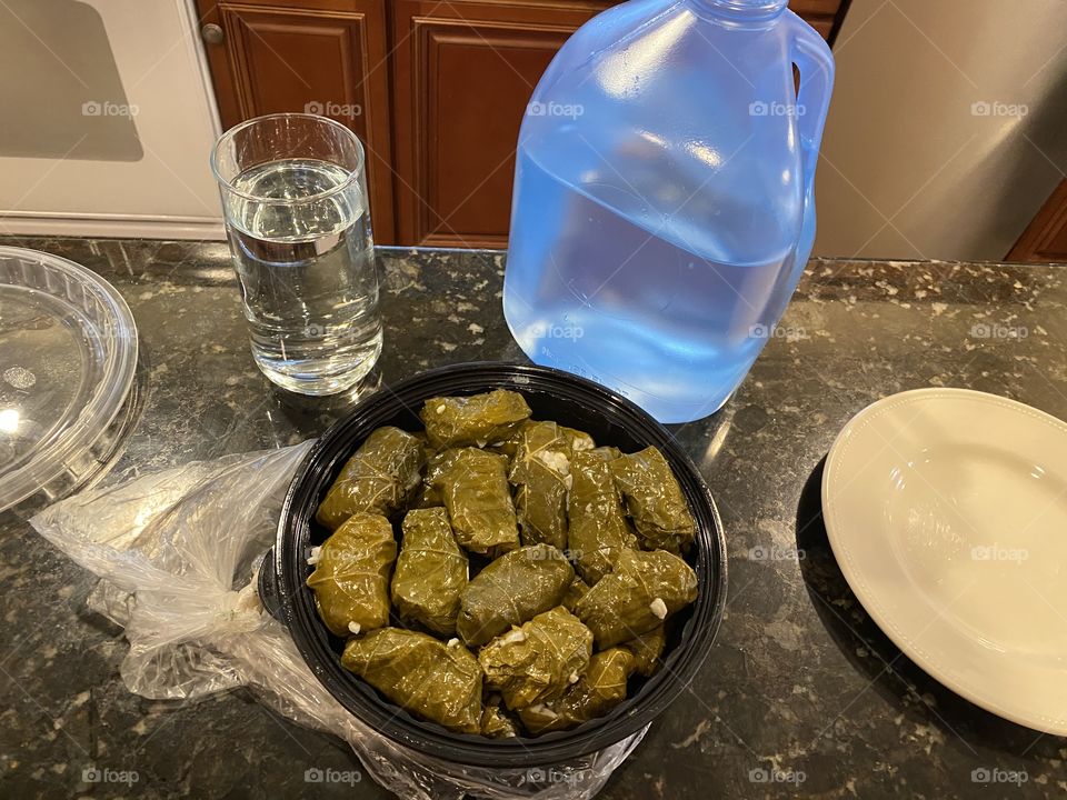 Stuffed grape leaves and KANGEN water.