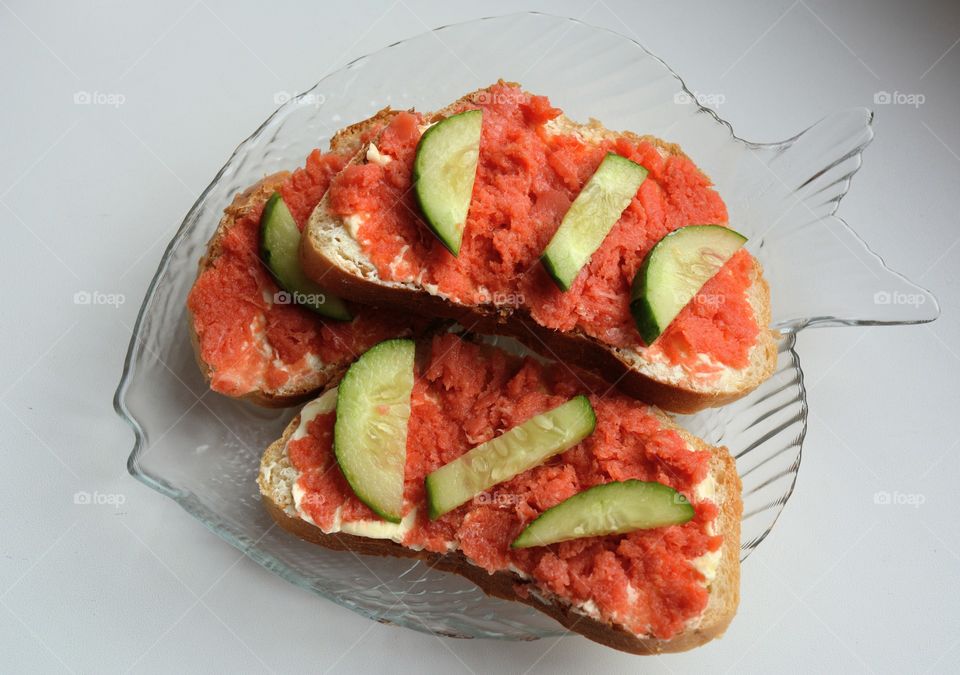 sandwiches with red fish and cucumber