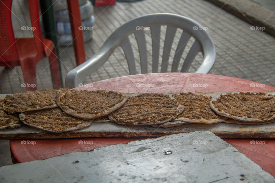 Newly baked manouche cooling on the side of street. I smelled them before I saw them....delicious and still steaming hot