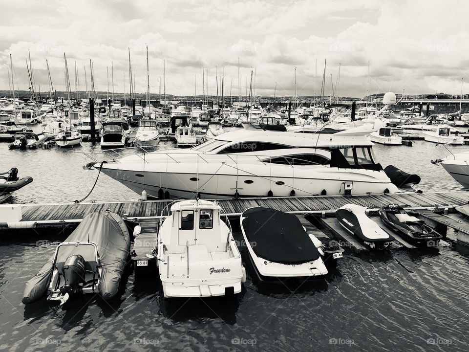 I never tire of getting the black and white take on a photograph, this is an example of how an affluent harbor looks in such a mode.