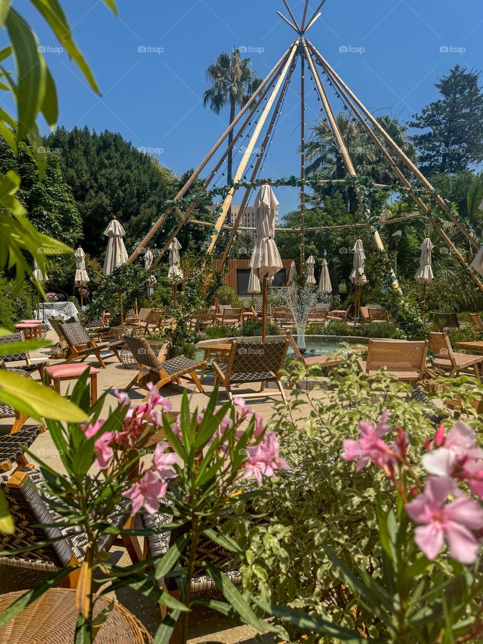 deck chairs in the garden by the fountain