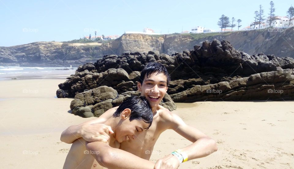 Boys playing on the beach