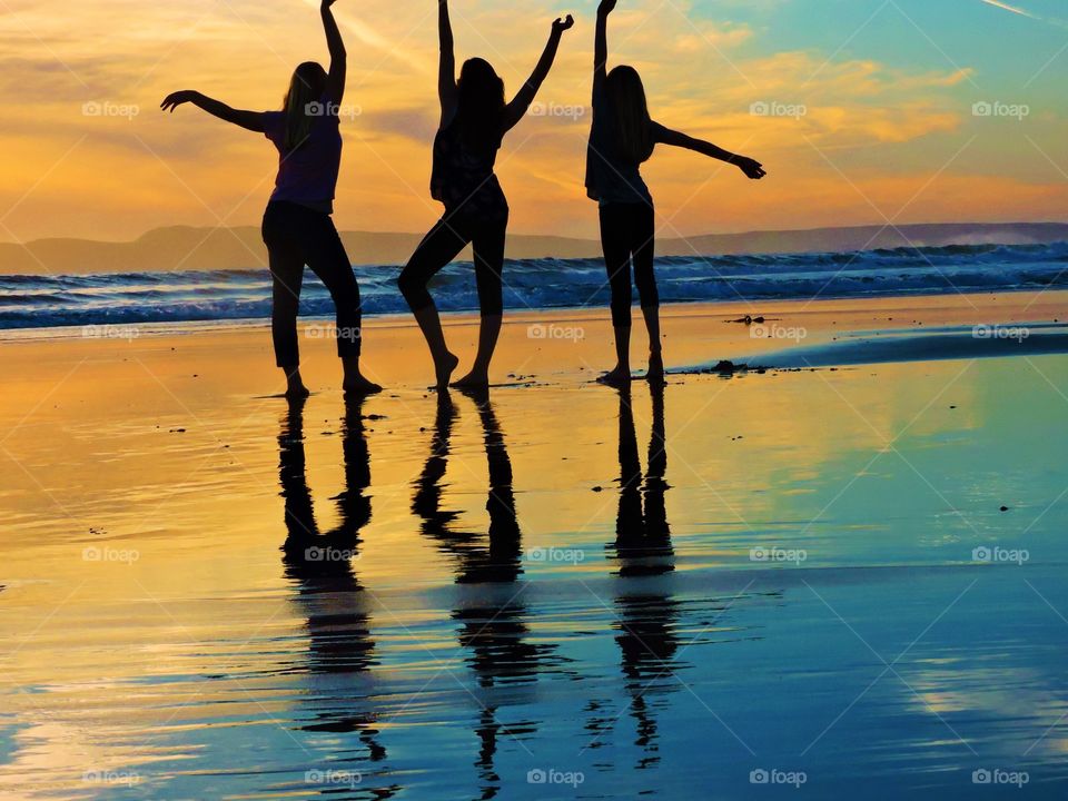 Three divas enjoying the beach