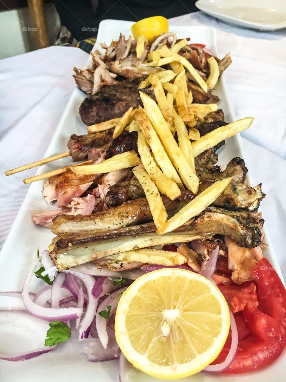 Greek grilled meat with fries