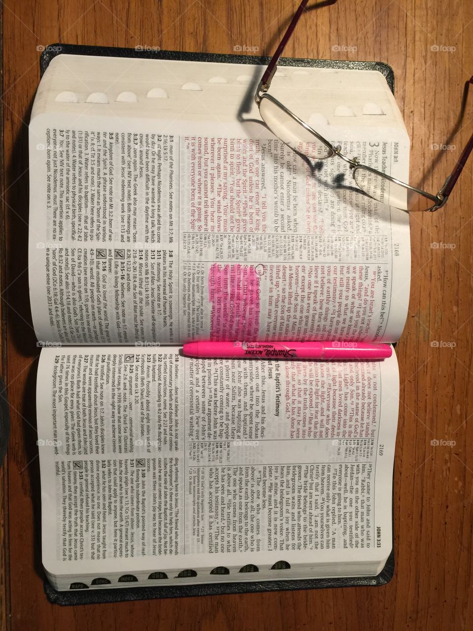 Bible with pink highlighter