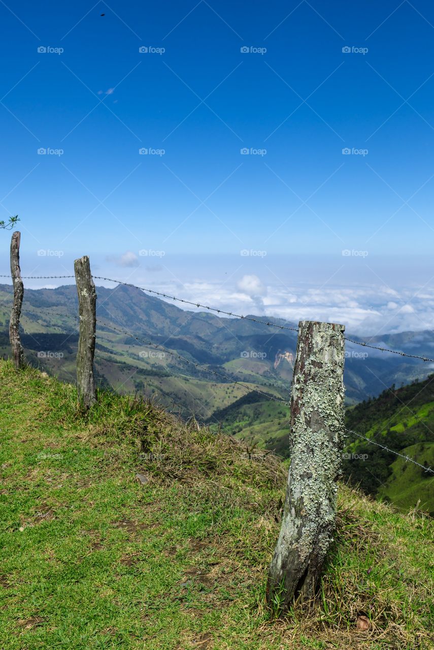 Green mountain scenery with blue and cloudy sky ecuador