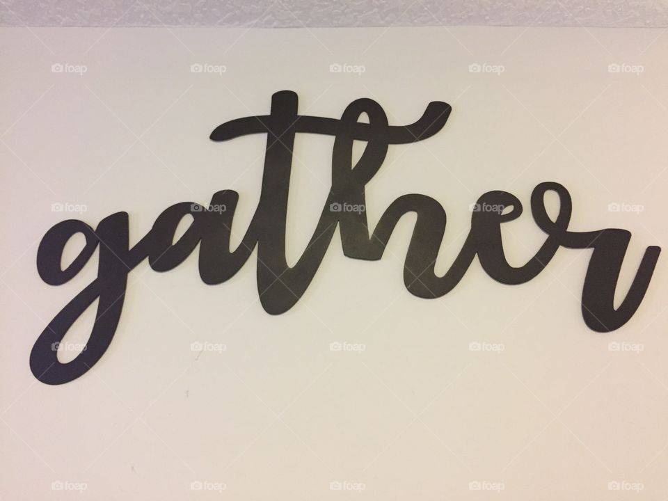 Thw word gather in cursive