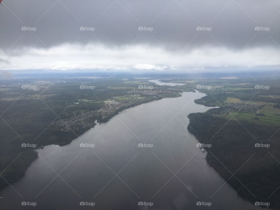 Clouds above the river from a plane 