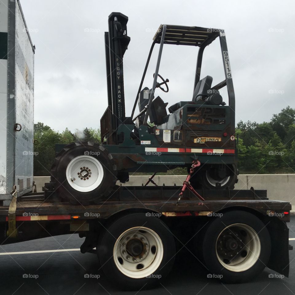 Fork Lift on back of truck out for delivery!