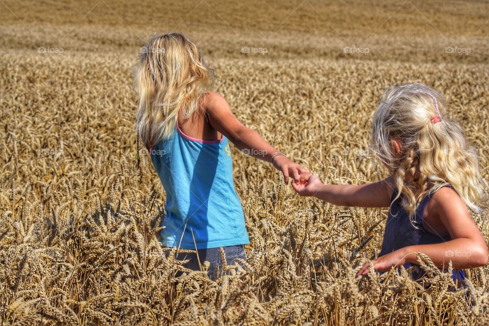 Follow me. Walking in the field