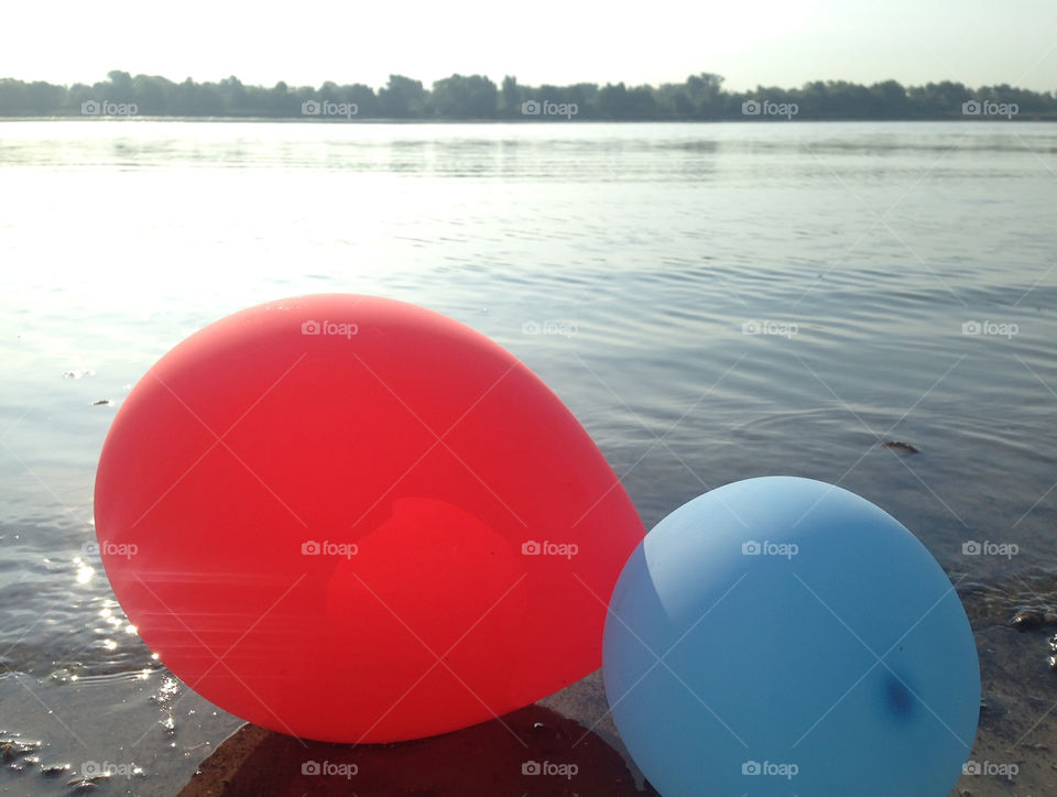 colorful balloons on the water