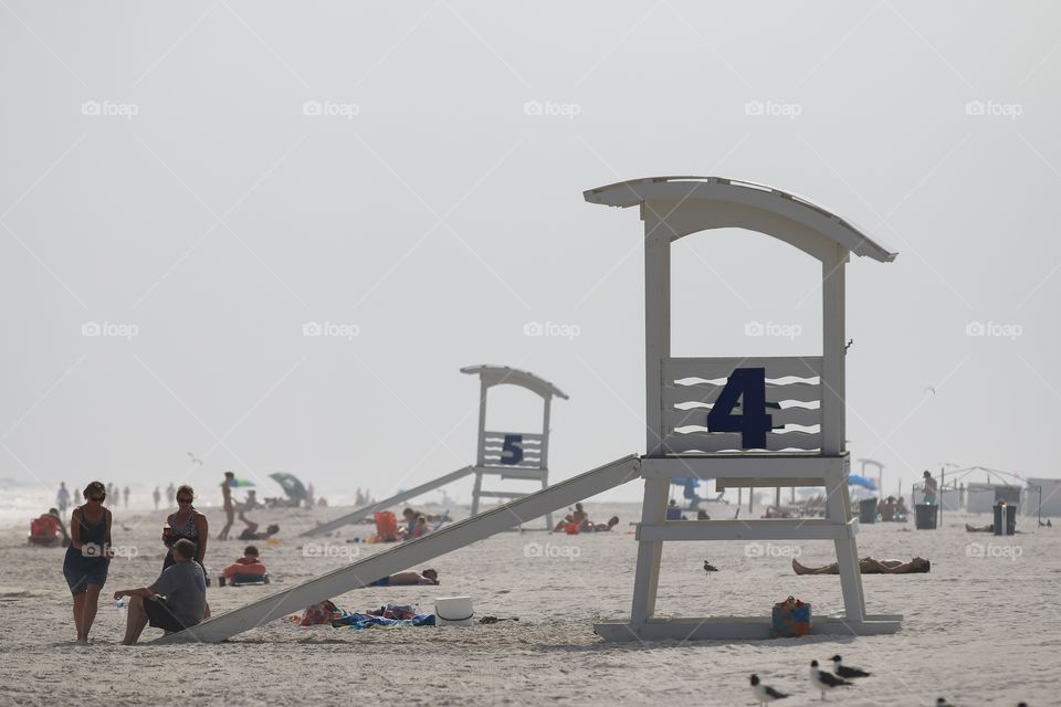 Lifeguard station in the beach with people