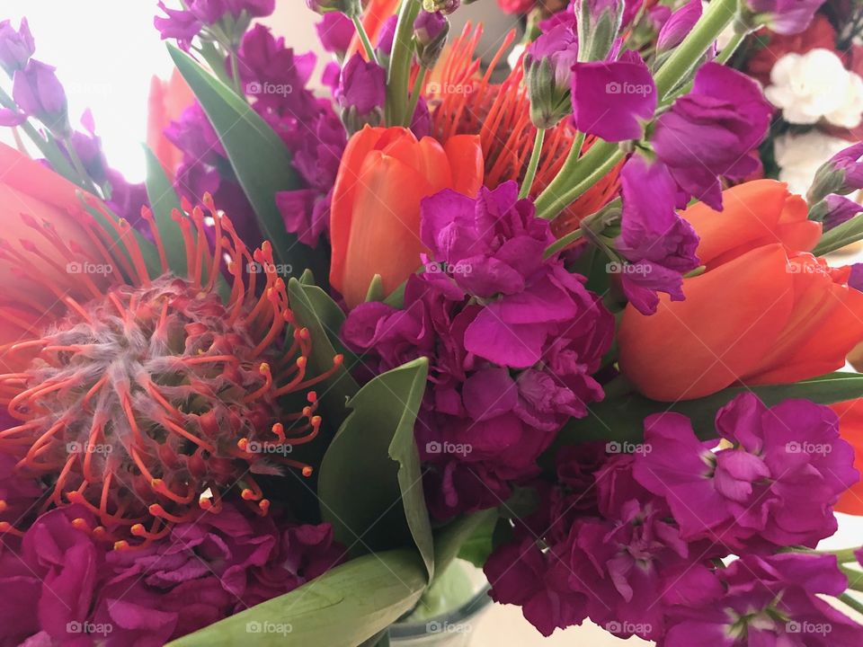 Bouquet with all shades of magenta and dark pink purple flowers