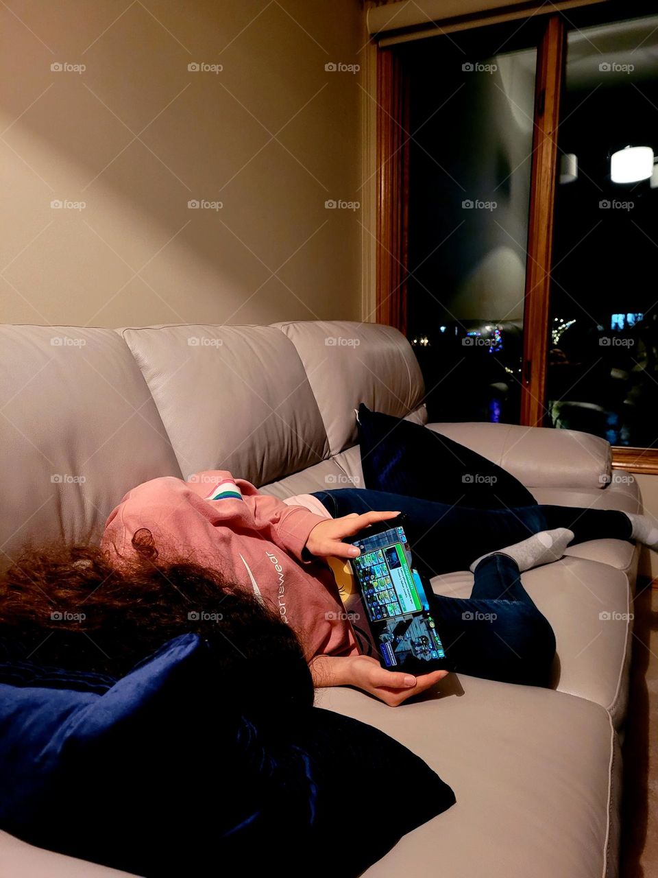 playing game on the couch