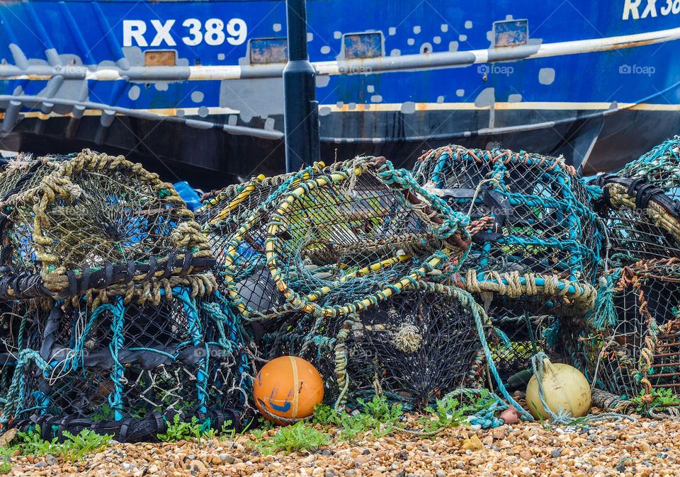 Fishing nets and crab pots on Hastings fisherman’s beach 