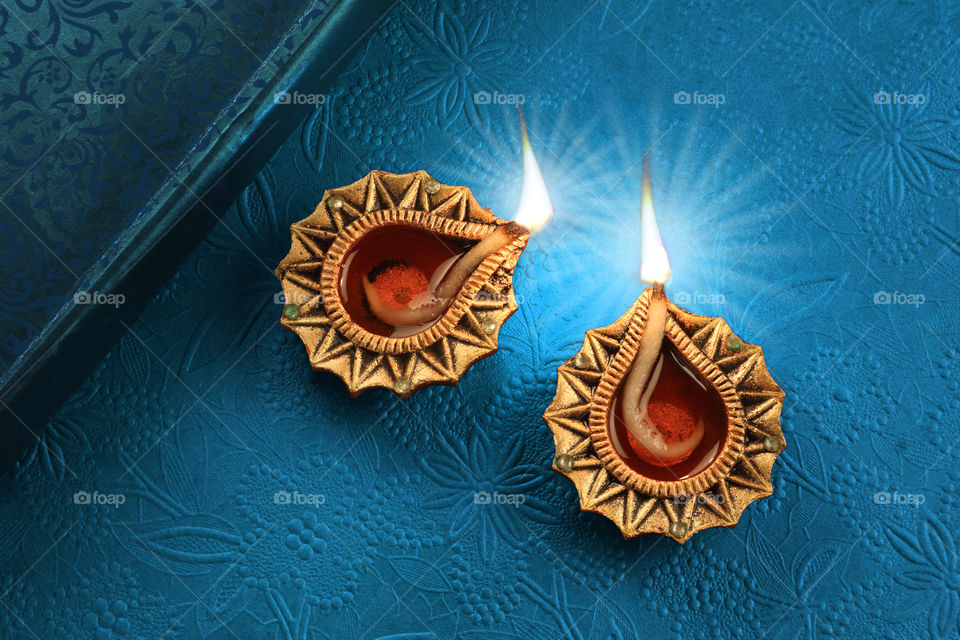 Beautiful golden Diwali diya lamp light