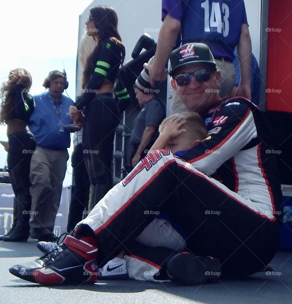 NASCAR Driver Clint Bowyer And Son Waiting For Race