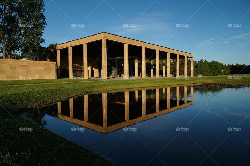 Monumenthallen Skogskyrkogården. Have visited my favourite photo spot again, this time i was focused on buildings. The building that beautifully reflects in the water is Monumenthallen and is located at Skogskyrkogården (The Woodland Cemetary) Stockholm, Sweden.