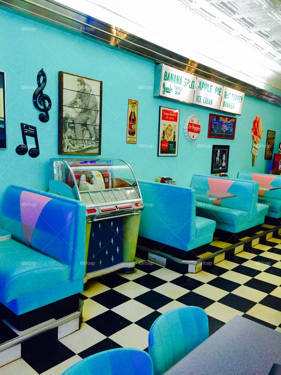 Malt Shop Diner with Jukebox and Americana classic ads. 