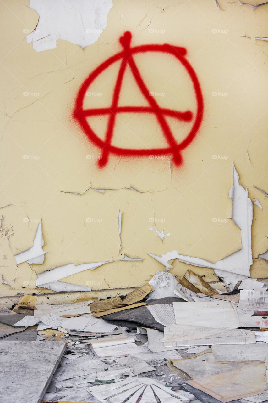 Anarchy sign, street art on the wall