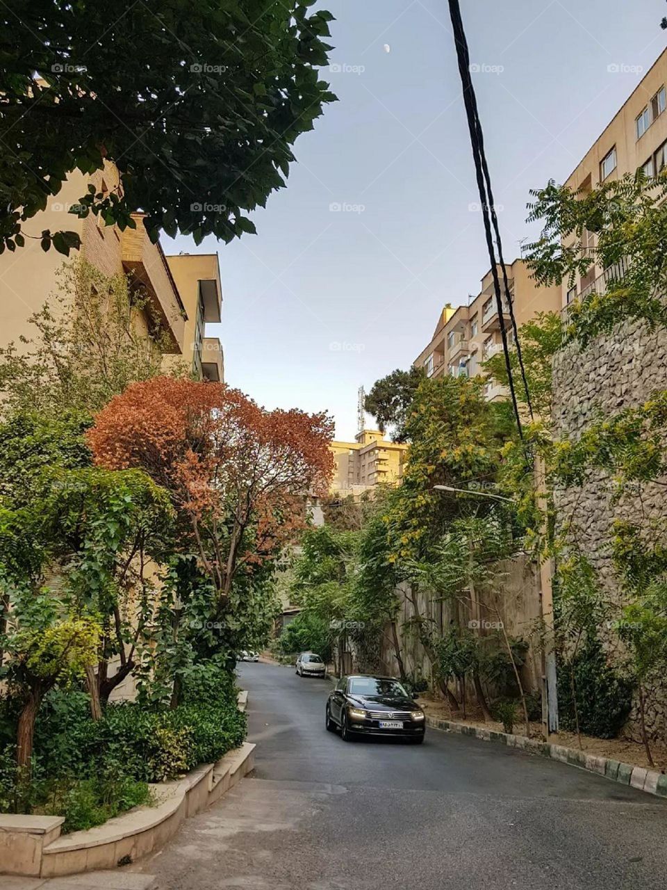 A quiet street, great air and light music make driving enjoyable