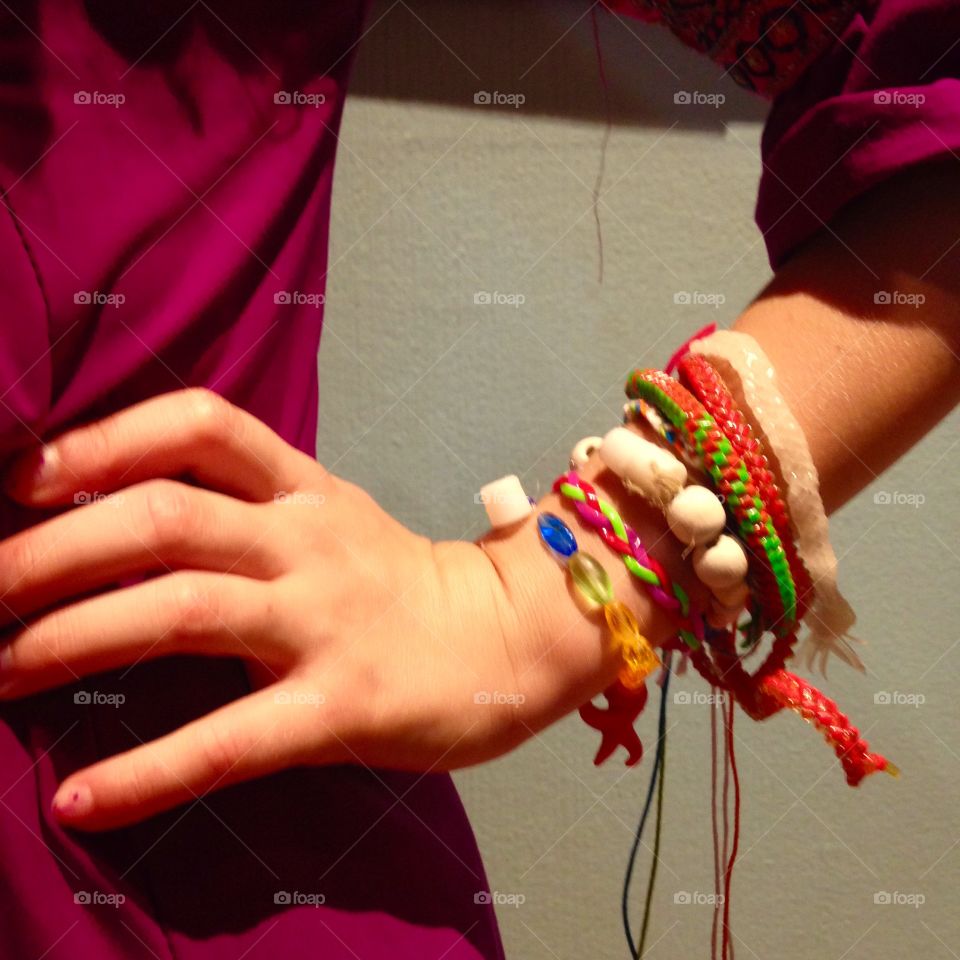 Beautiful, handmade, hand crafted bracelets of various materials, shapes and sizes, all on the wrist of the maker