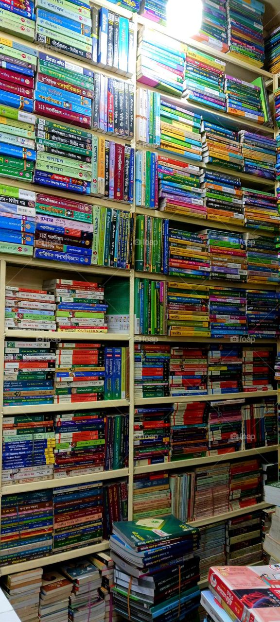 Secondhand bookstall at Nilkhet Book Market. Dhaka, Bangladesh.