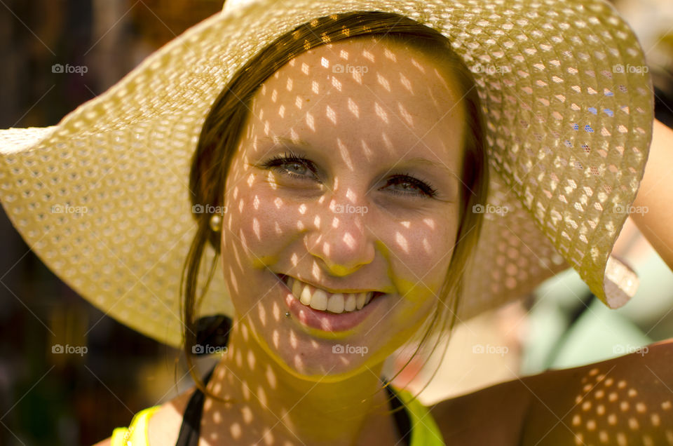 Smiling woman wearing hat