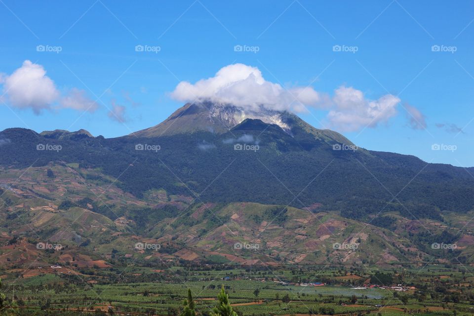 Mount Apo shying away with the Clouds