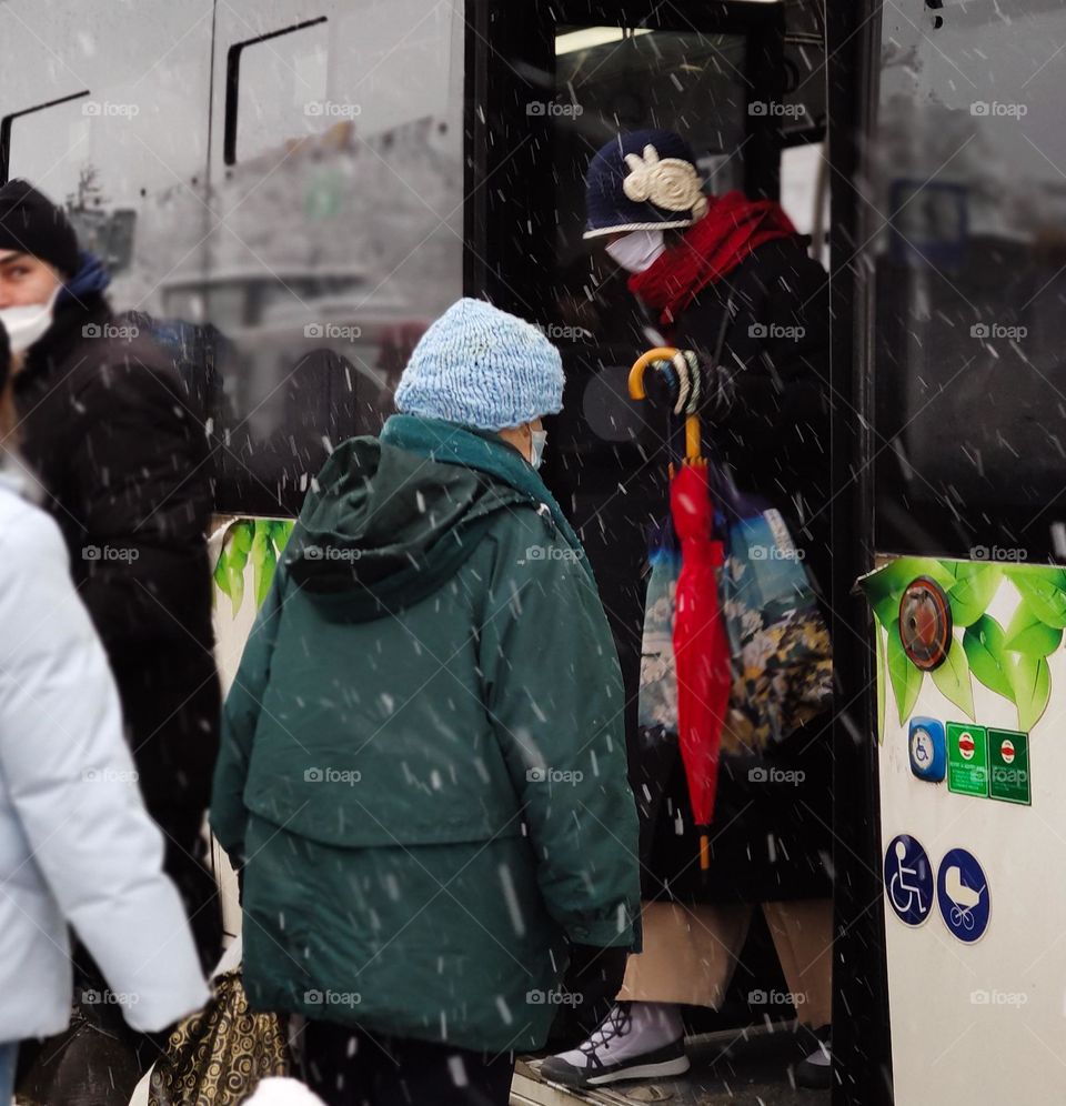 Commuting in the snow city via bus