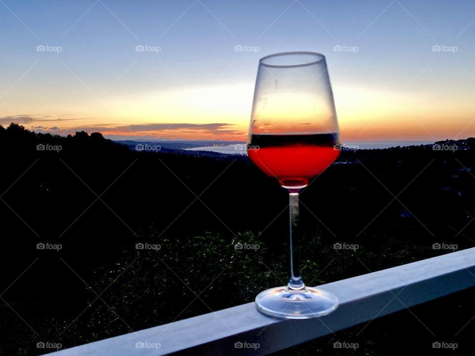 Wine time reflecting on the spectacular sunset that warms the soul and calms the mind.