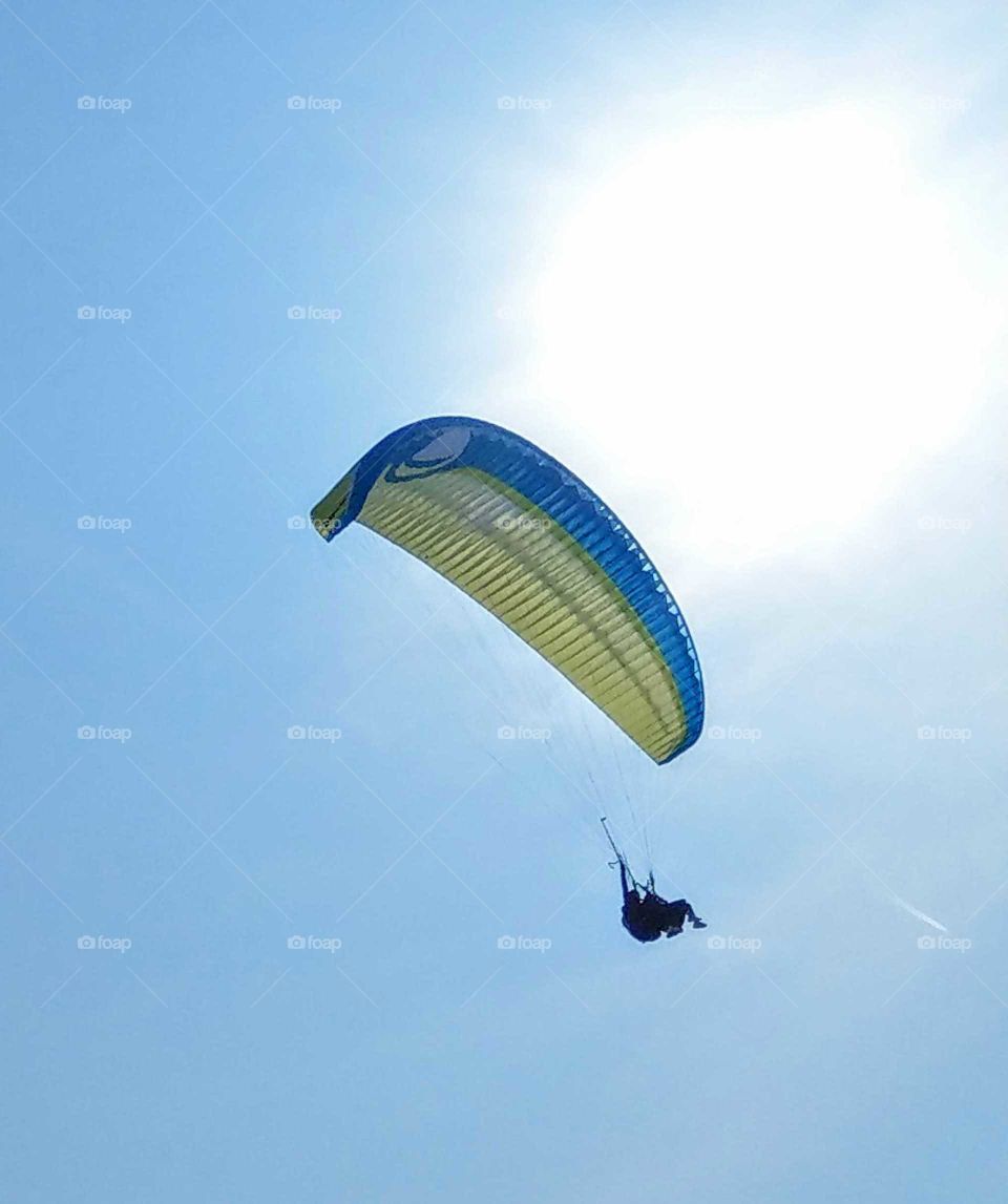 The art of composition: paragliding is a challenging sport and can enjoy flying. an adventure activity.