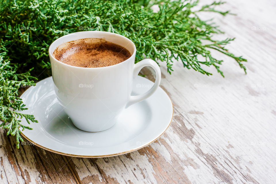 Coffee espresso on the wooden background 