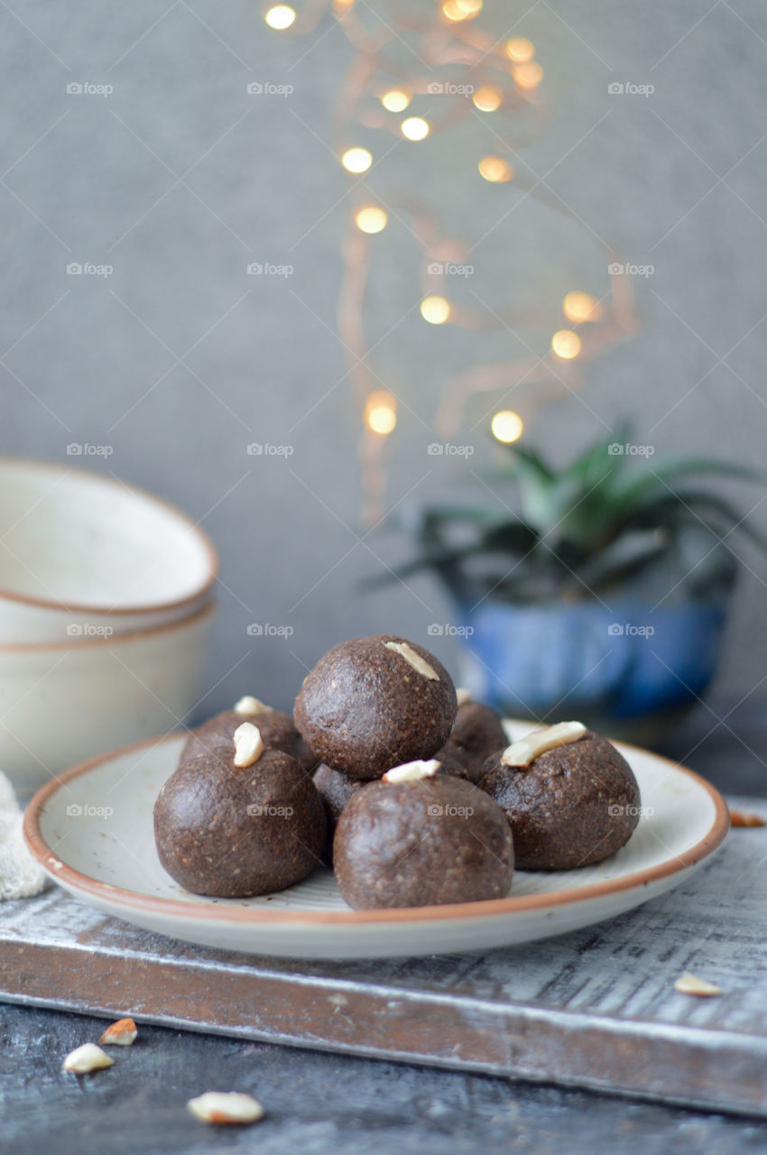 Ragi/ finger millets is a whole grain that is gluten free and is rich in fiber. It is packed with calcium, good carbs, ammino acids and Vitamin D. These are Ragi laddoos Indian snack made with ragi flour and liked by kids and family.