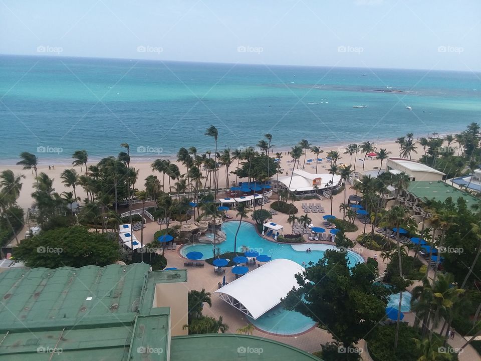 hotel balcony pool and beach view