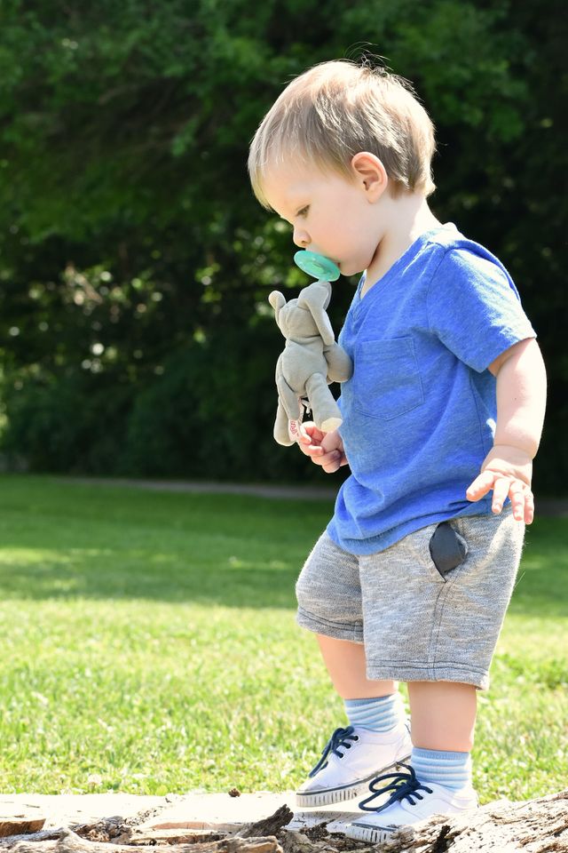 Cute baby boy at nature park