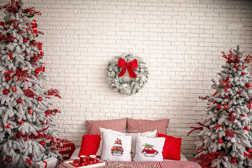 Christmas decorated pillow, festive atmosphere. Home decor.