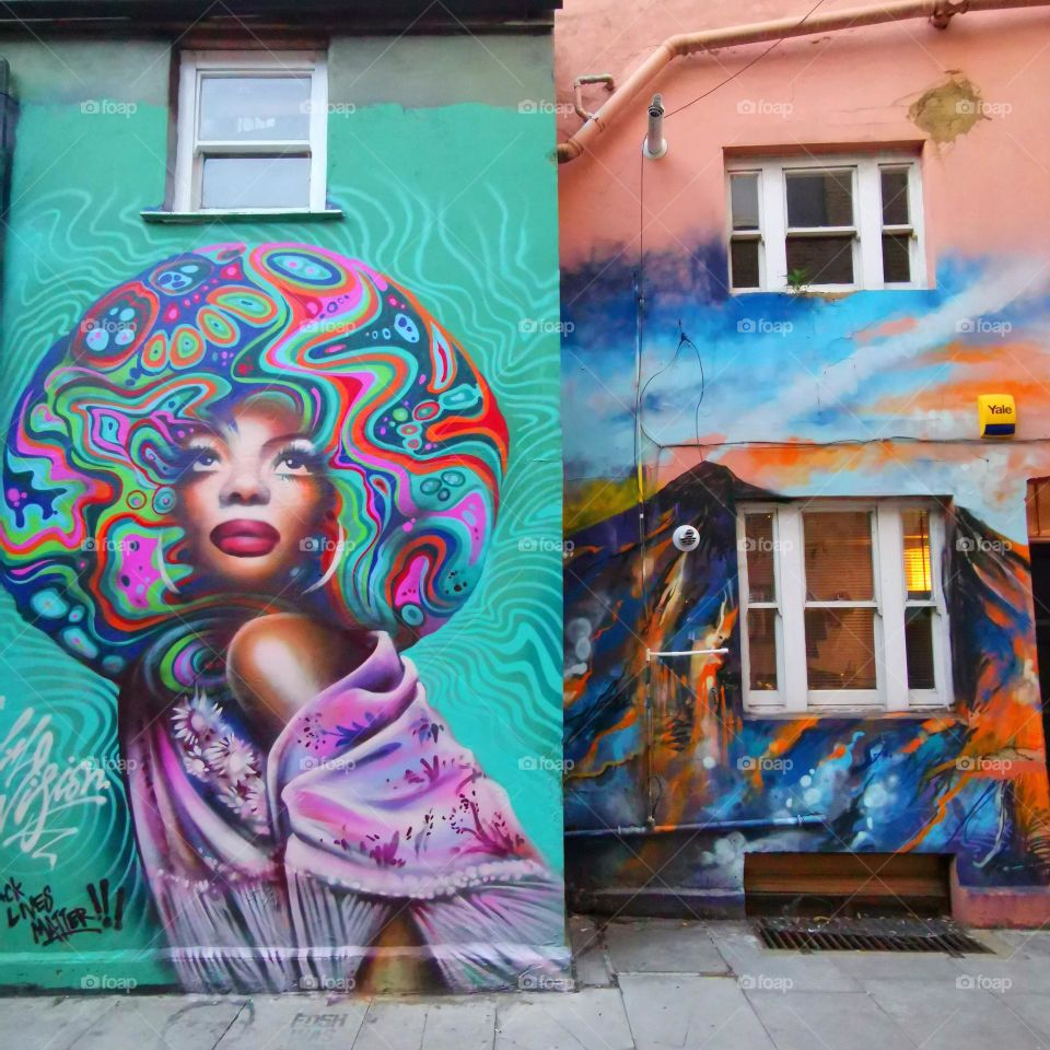 Beautiful murals in Camden Town, London. Visual street art.