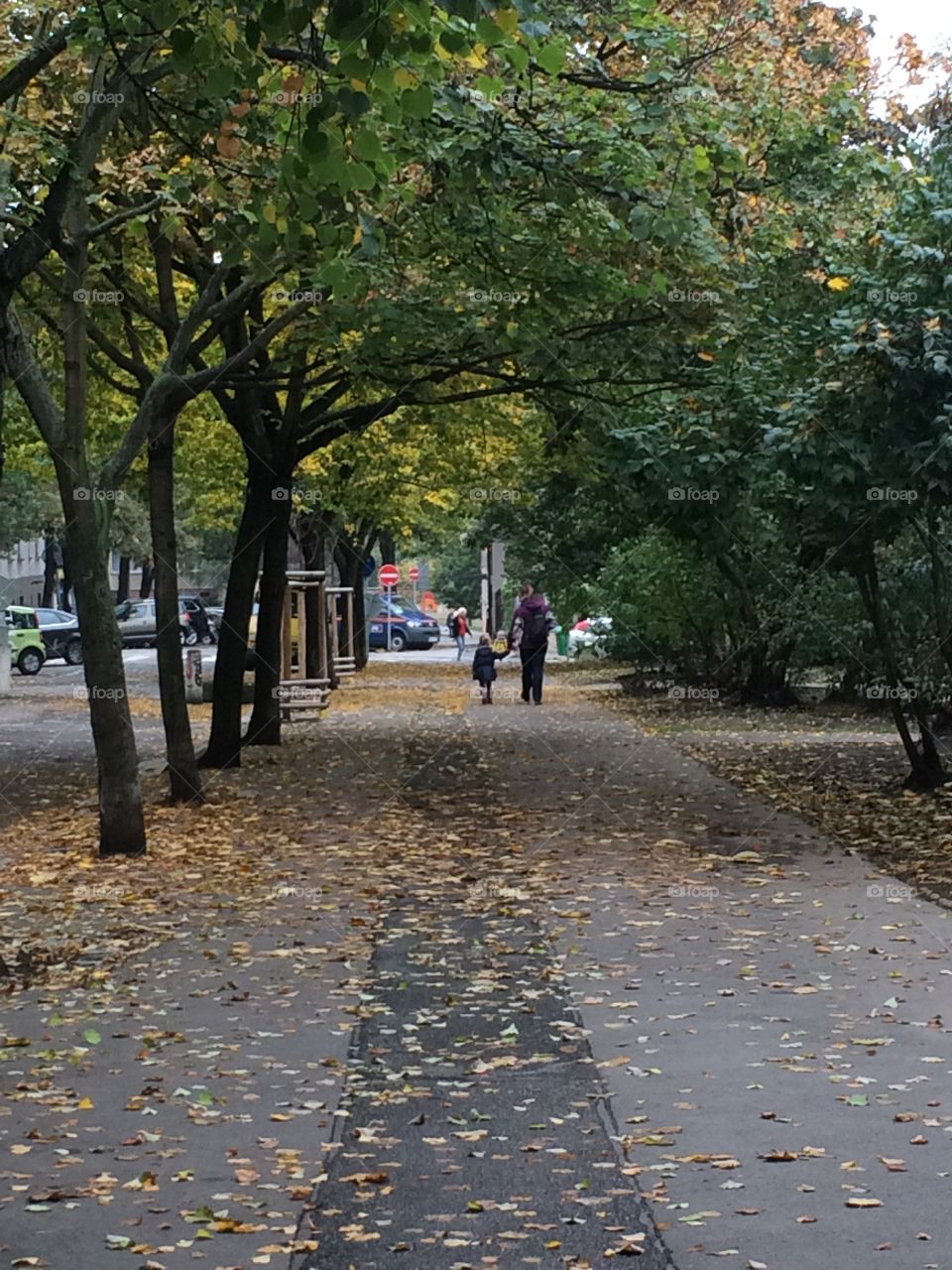 Mother and daughter in autumn. Mother and daughter walking in autumn in Prague