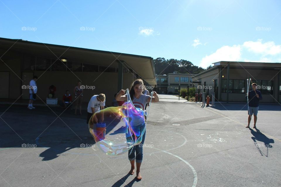 Making bubbles. Fourth of July bubble contest