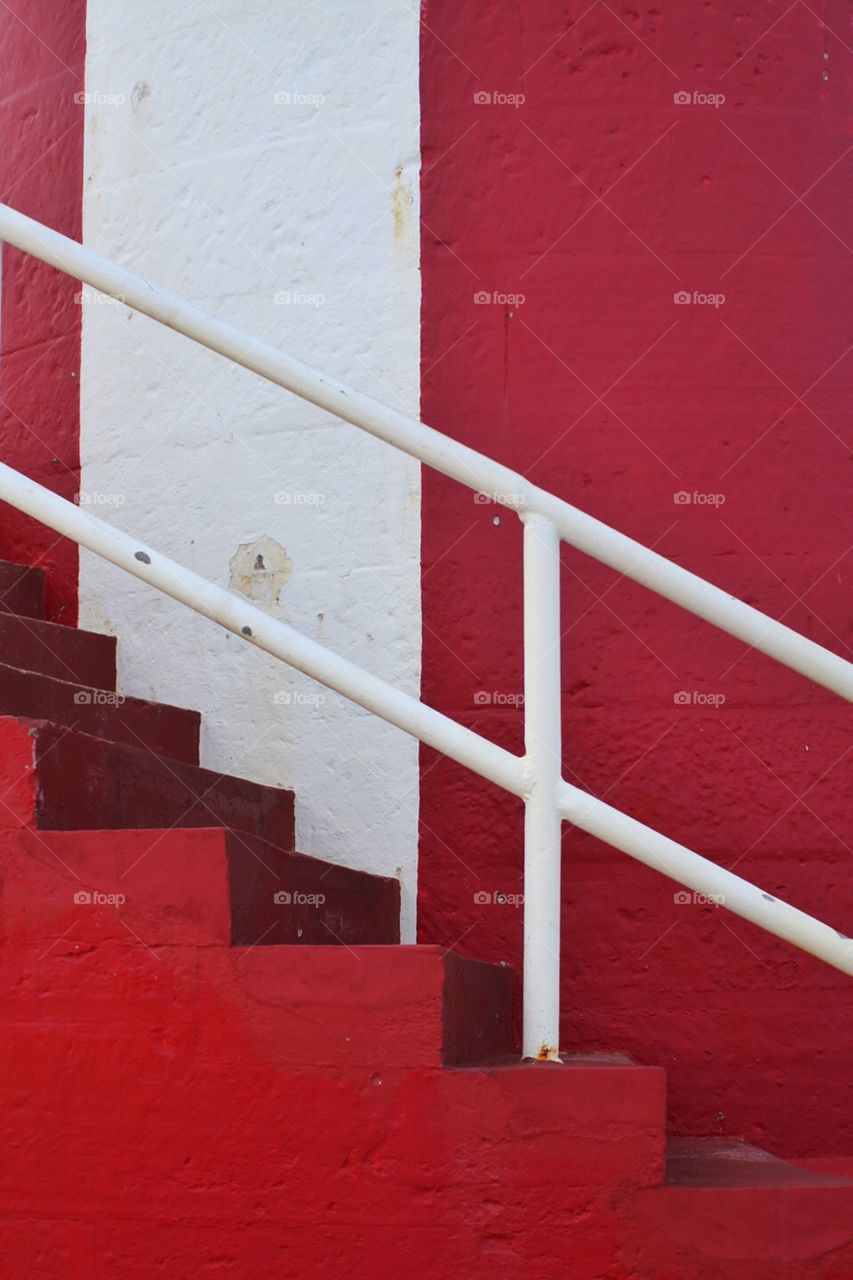 White and red pattern on wall and stairs
