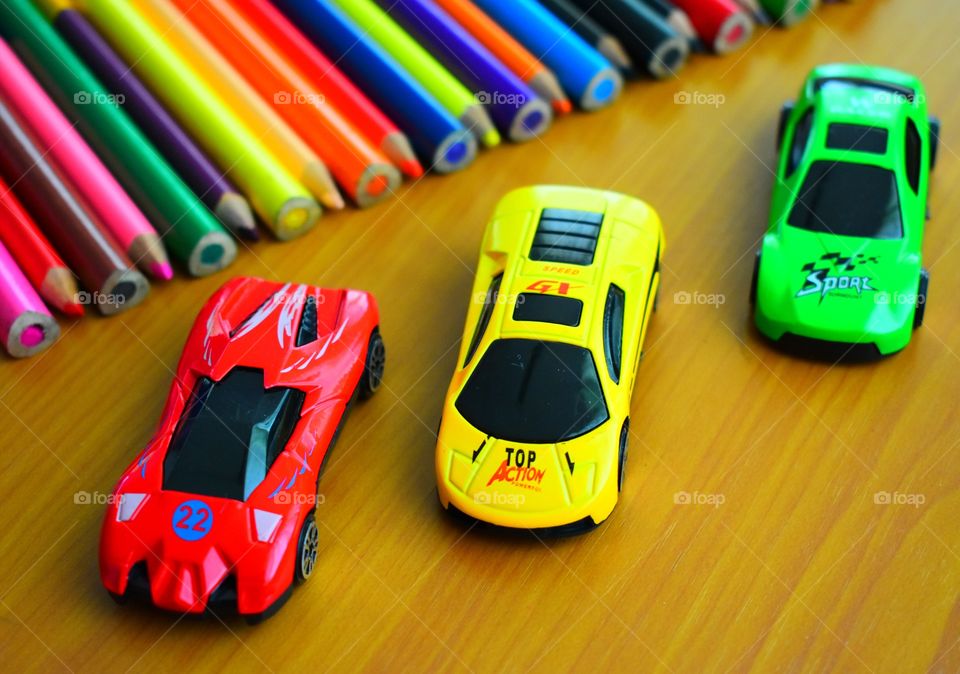 Colorful toy cars with color p
