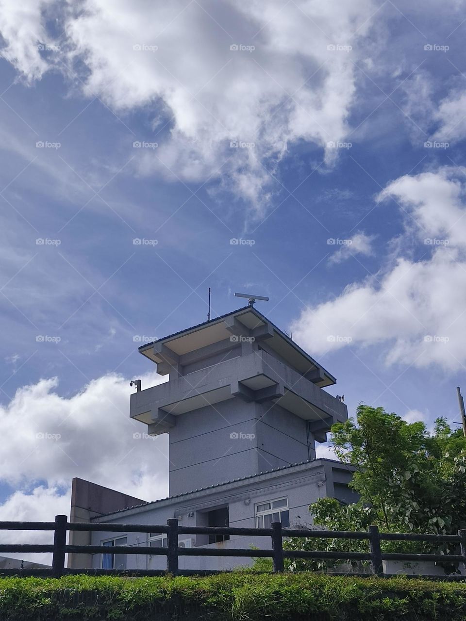 Looking up at the buildings and the sky