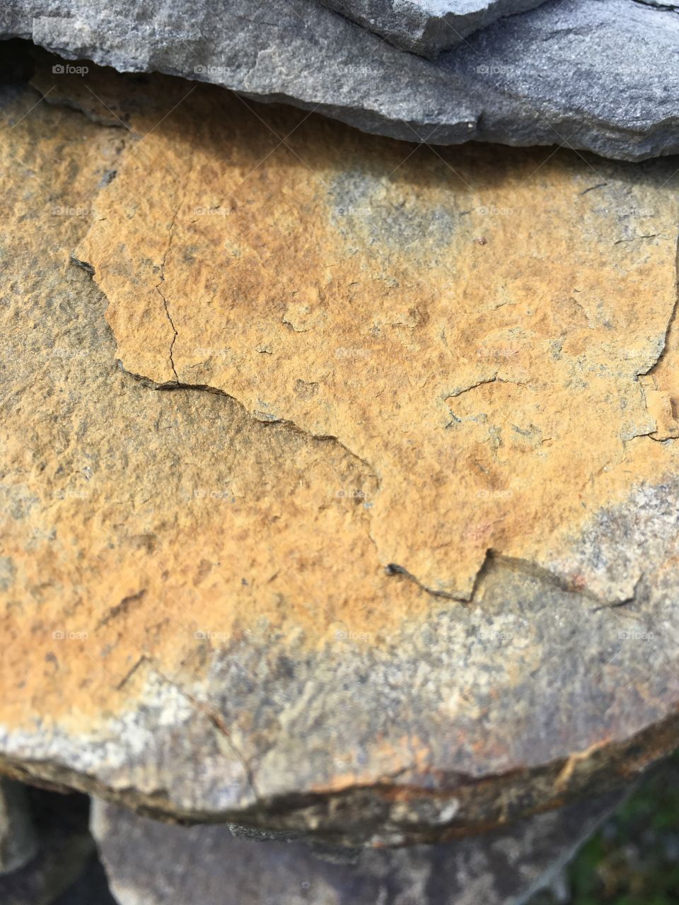 Orange and rust coloured stone