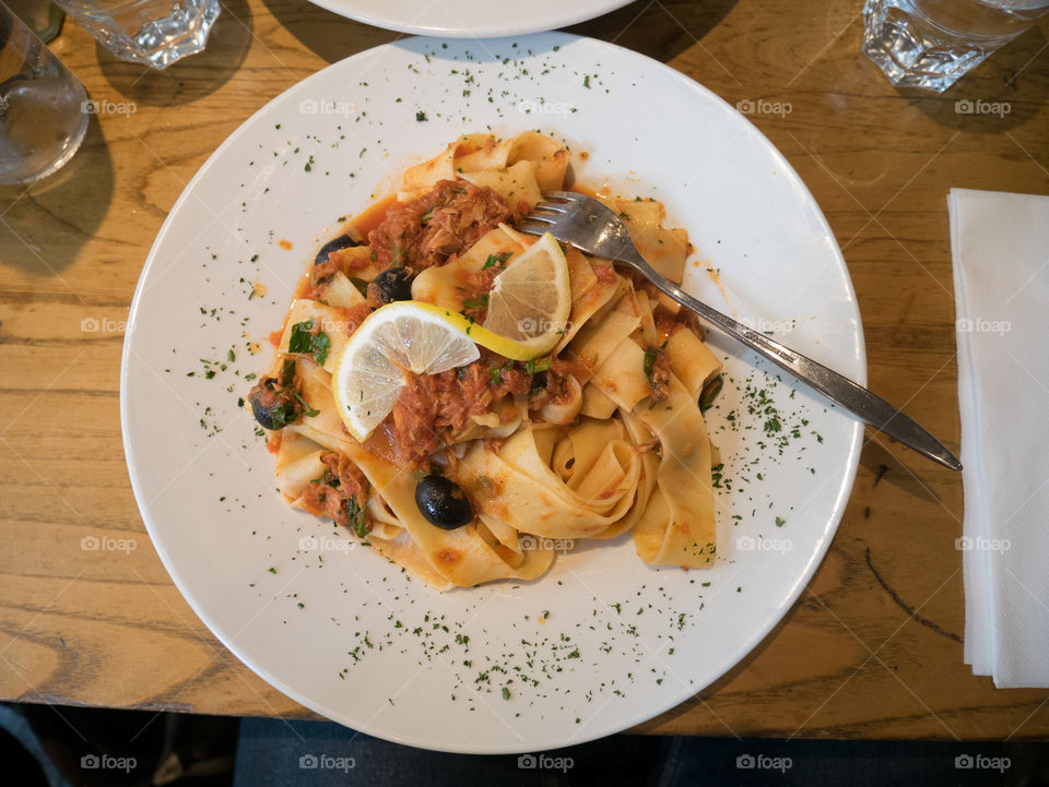 Pasta on table in restaurant