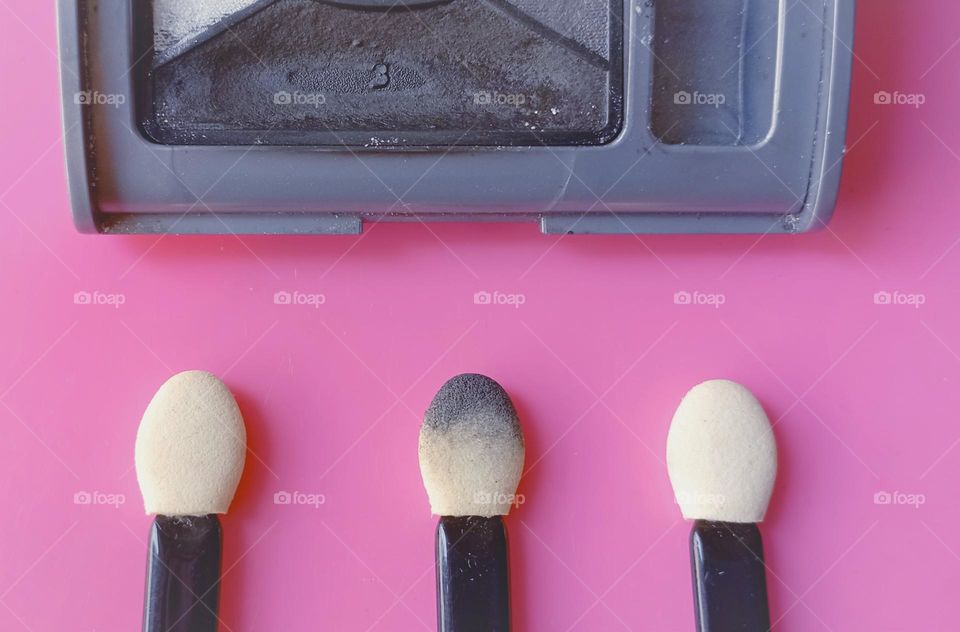 been used eyeshadow and brush