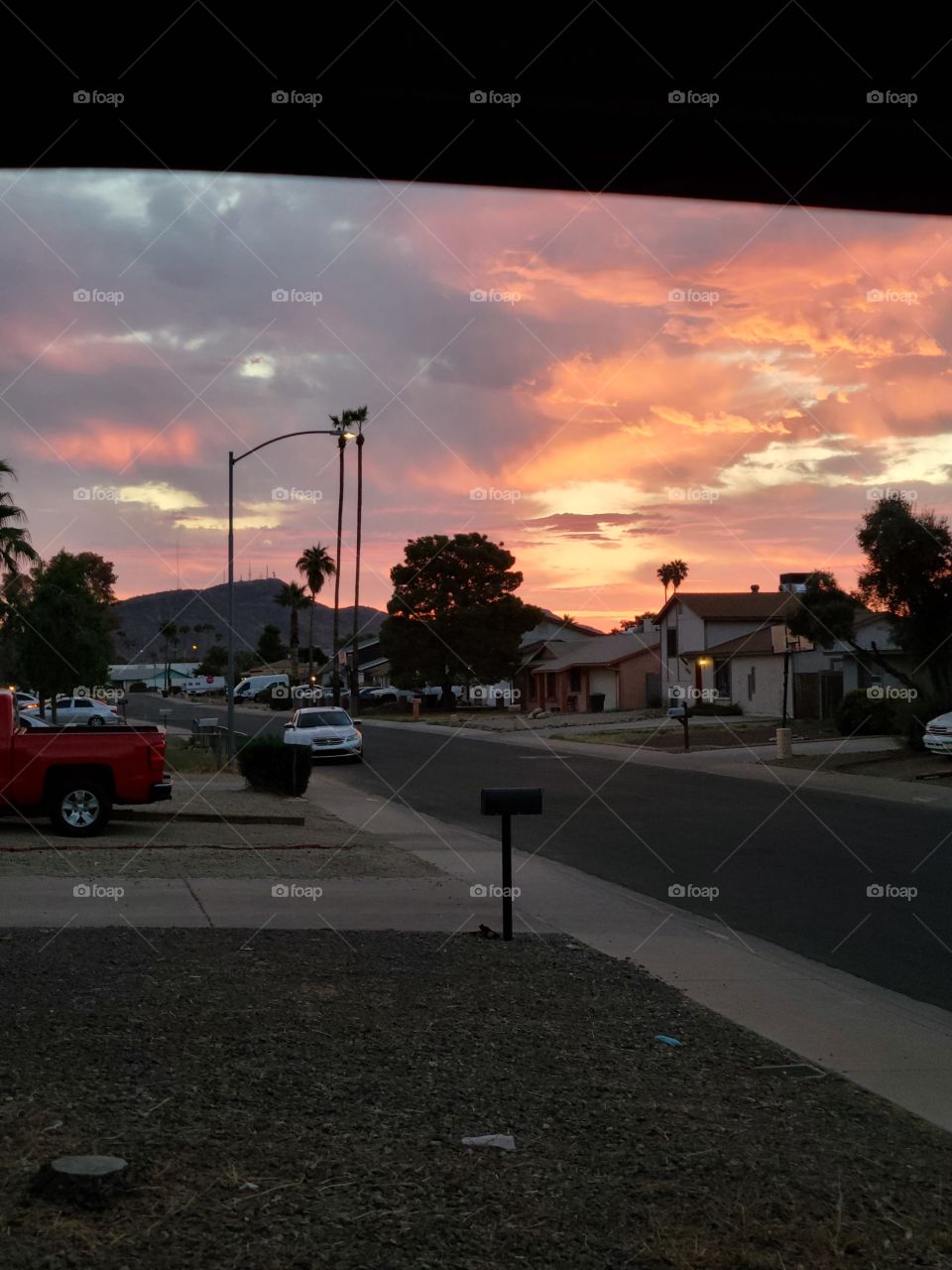 Beautiful AZ. autumn sunrise, with blues bright orange over city