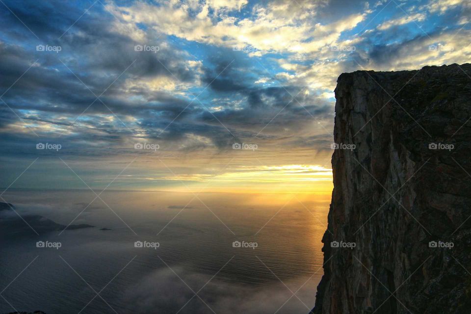 The wall. Close to midnight on Kvaløya island. The light is from the midnight sun. The wall is part of the mountain "Brosmetinden"