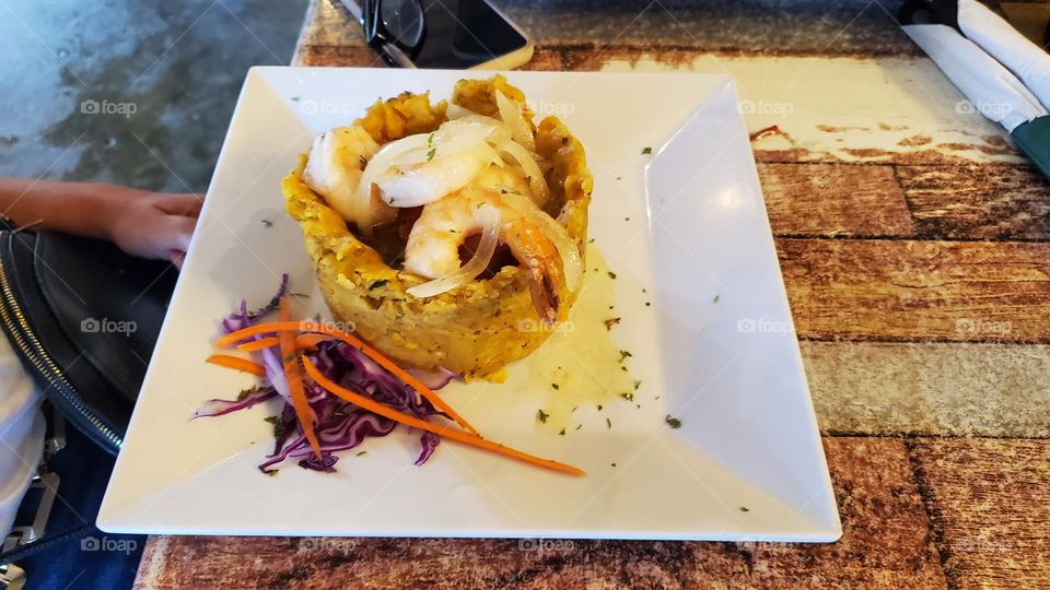 Mofongo con camarones.  Mashed plantains with shrimps.
